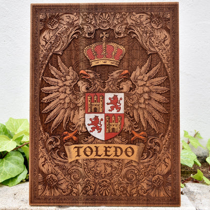 Engraved wooden wall poster featuring the historic coat of arms of Toledo, Spain, with intricate heraldic details carved into natural wood.