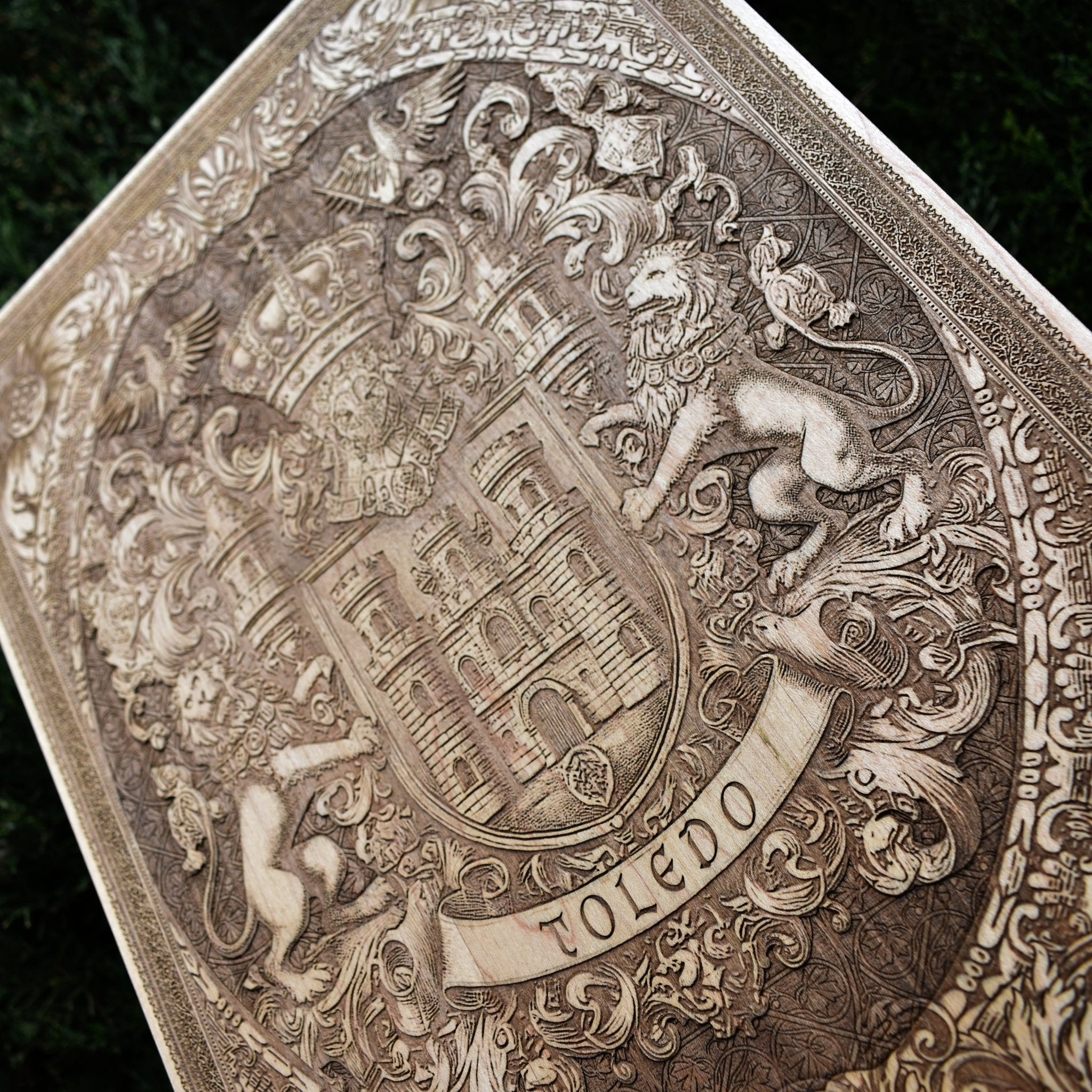 Toledo Spain city shield engraved on wood, elegant heritage wall decor.
