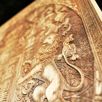 Traditional Toledo coat of arms wall hanging, handcrafted wood design.