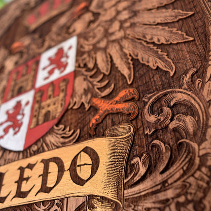 Engraved wooden wall poster featuring the historic coat of arms of Toledo, Spain, with intricate heraldic details carved into natural wood.
