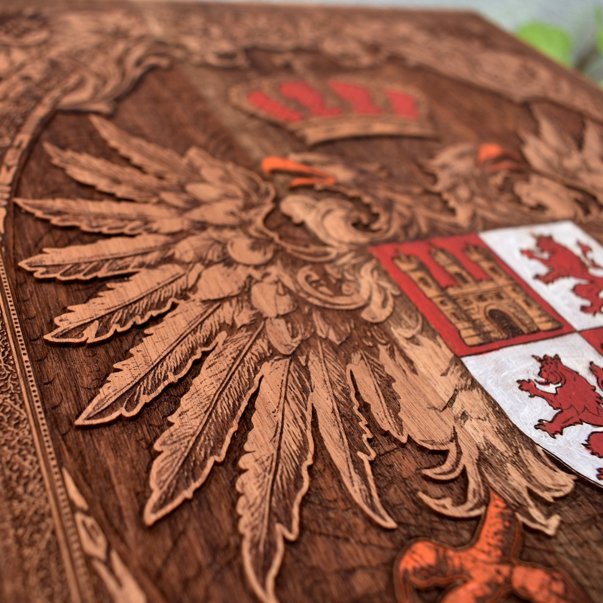 Engraved wooden wall poster featuring the historic coat of arms of Toledo, Spain, with intricate heraldic details carved into natural wood.