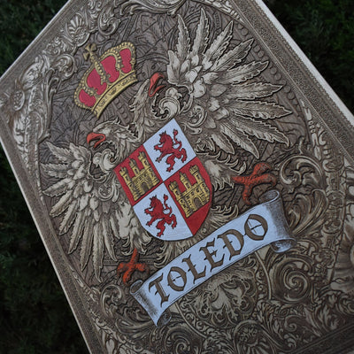 Heraldic wall art of Toledo family crest in engraved wood