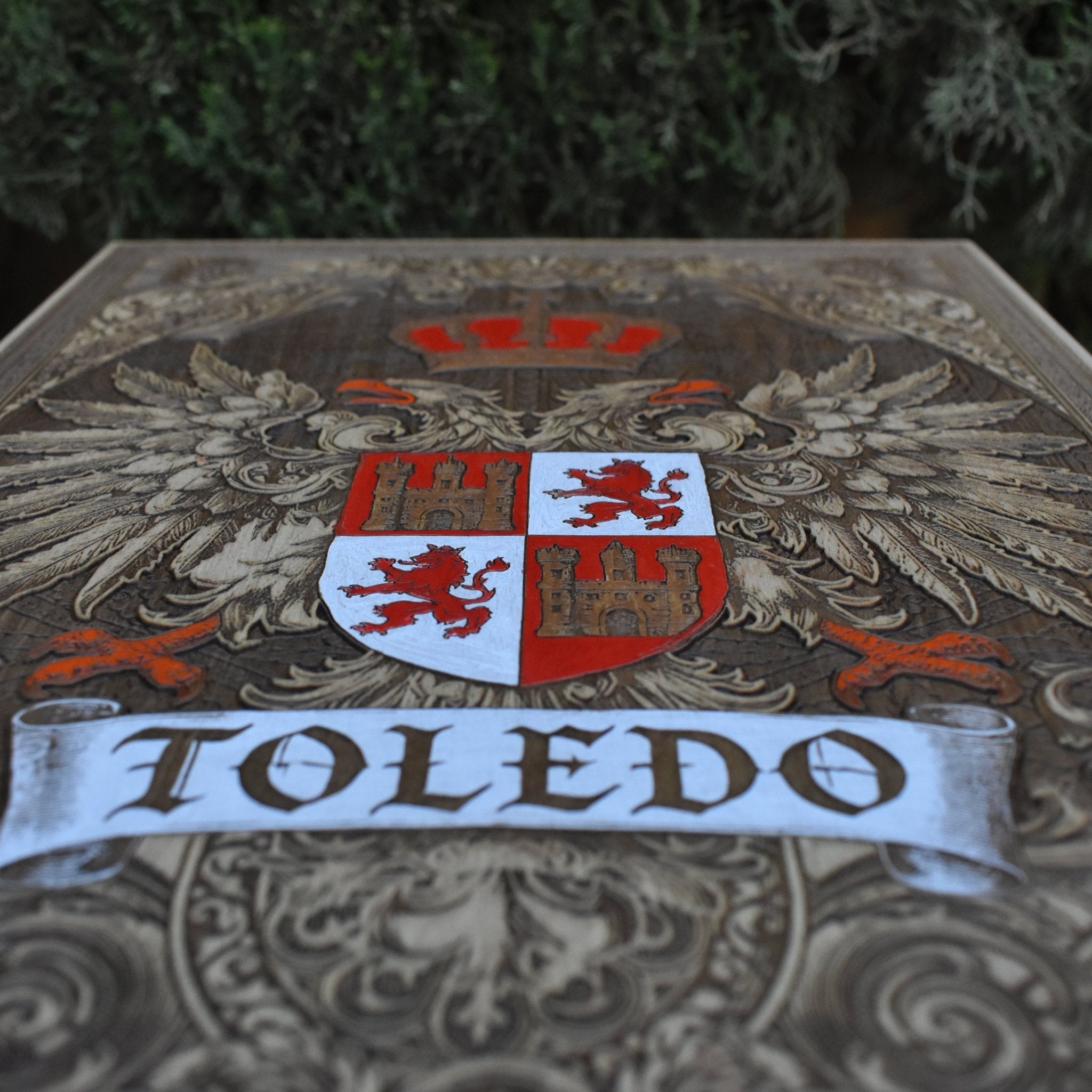 Handcrafted Toledo crest wood plaque with historical design