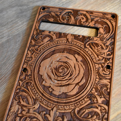 Handcrafted tremolo Stratocaster cover – cherry wood, engraved art design