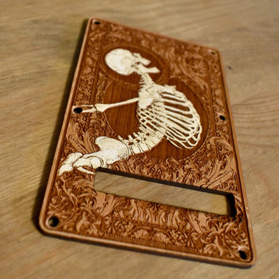 Stumble Painted Tremolo Cover for Stratocaster Electric Guitar – gothic art, engraved wood, dark fantasy, skeleton design, artisan crafted
