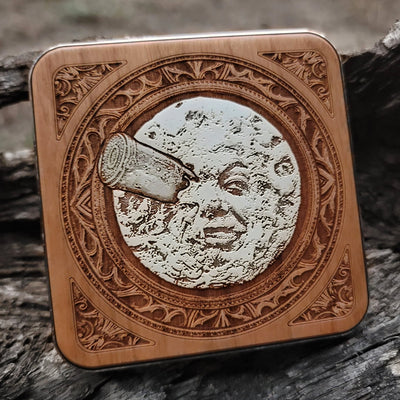 Wooden wireless charger featuring vintage moon illustration.