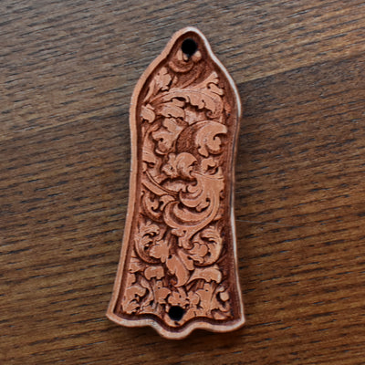 Custom cherrywood truss rod cover for Gibson Les Paul, featuring detailed floral engraving in gothic style, handcrafted by Engraver’s Dungeon.
