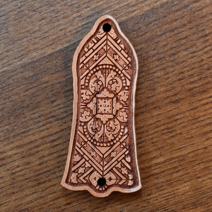 Engraved cherrywood truss rod cover for Gibson Les Paul, featuring floral and gothic decorative design handcrafted by Engraver’s Dungeon