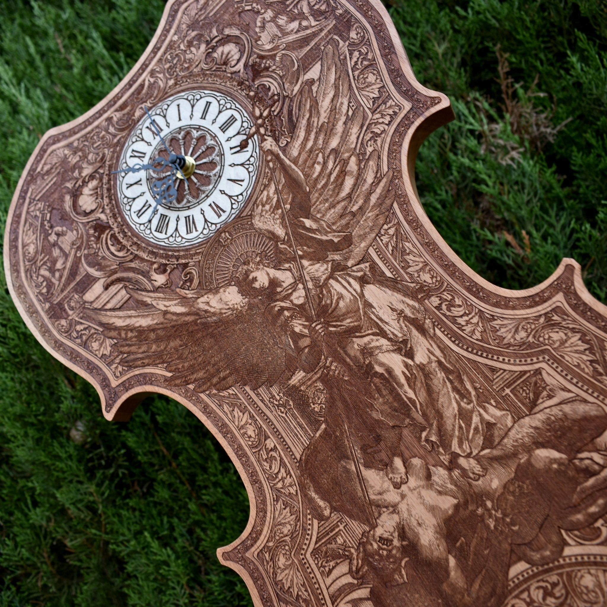 Handmade cedar wood violin clock with St. Michael laser engraving. Unique wedding & anniversary gift for music lovers & spiritual décor collectors.