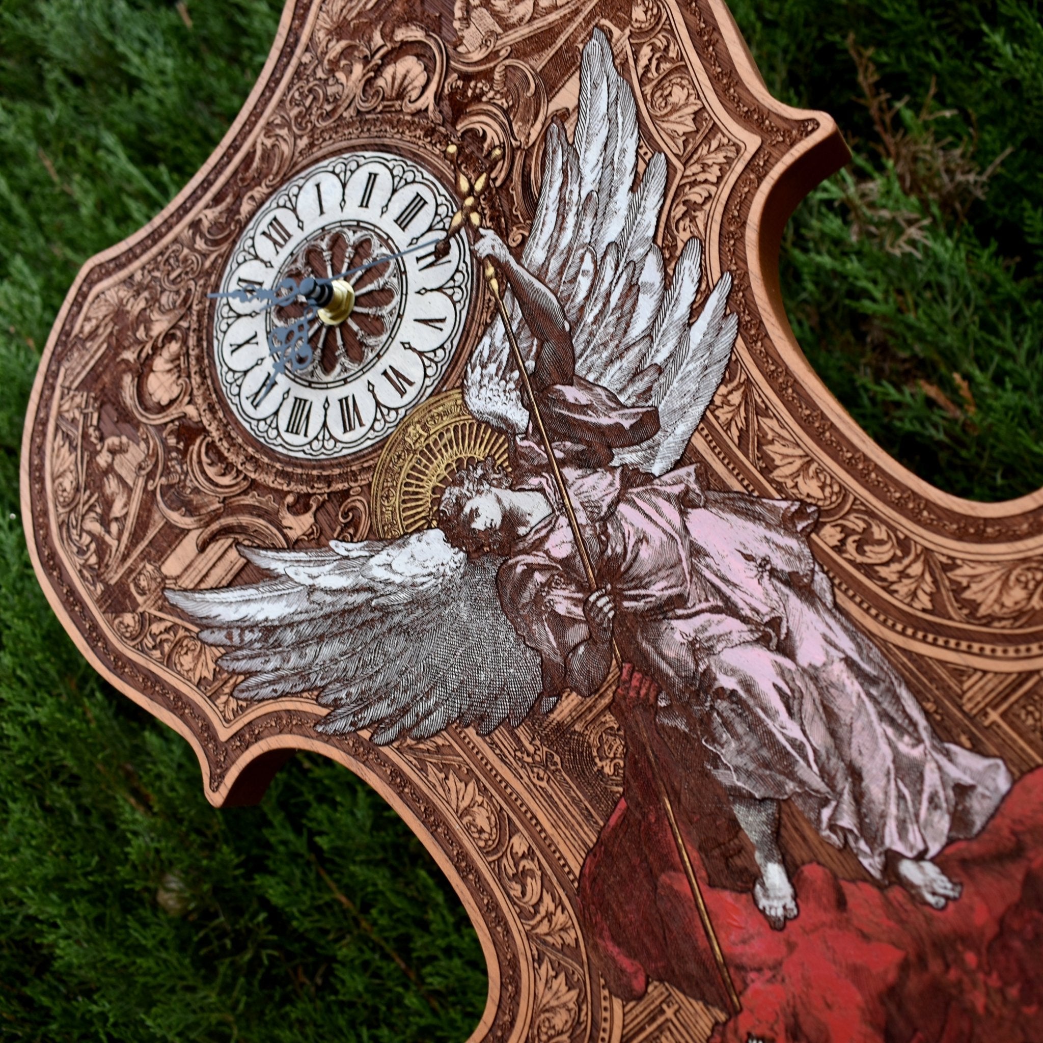 Hand-painted wooden violin clock featuring St. Michael, perfect for gothic wall decor.