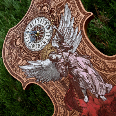 Hand-painted wooden violin clock featuring St. Michael, perfect for gothic wall decor.