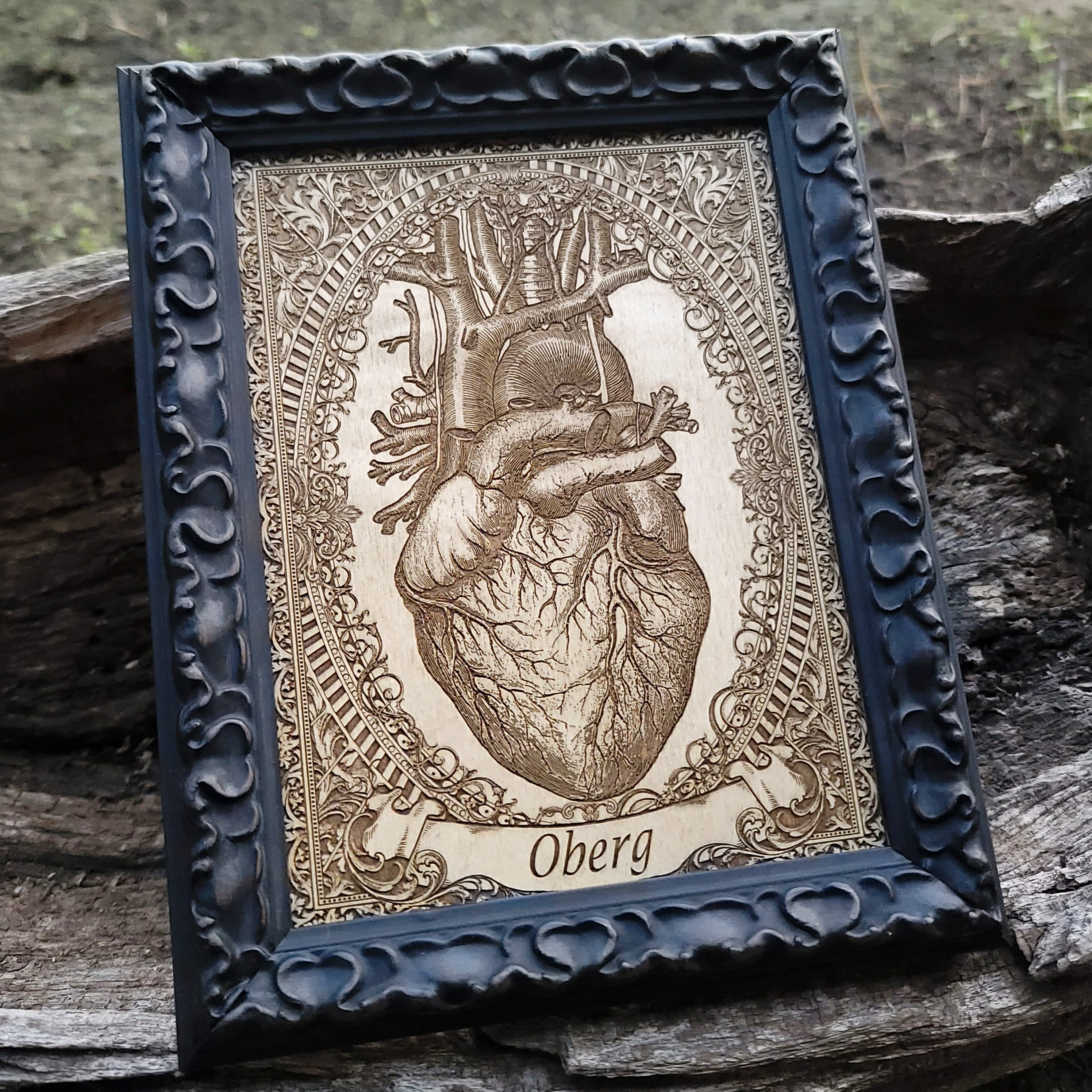 Personalized heart artwork with engraved banner text on wood