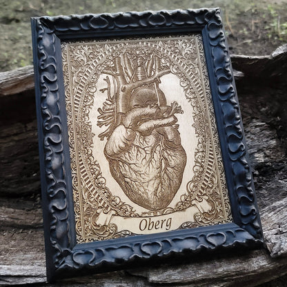 Personalized heart artwork with engraved banner text on wood