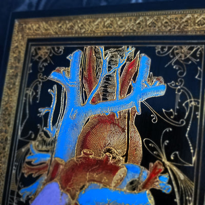 Black and gold anatomical heart wood wall art, perfect for gothic home decor.