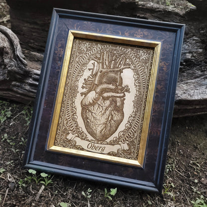 Custom wooden anatomical heart with engraved text banner, perfect for gifts