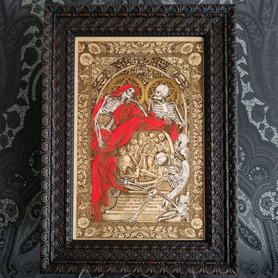 Decorative print of skeletons in a ornate frame on a patterned wall.