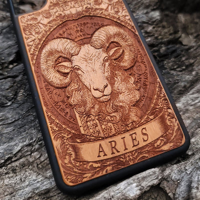 Laser-engraved Aries symbol on natural wood case