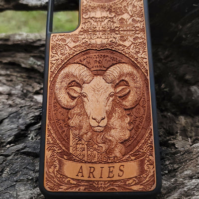 Aries astrology phone case with carved ram design