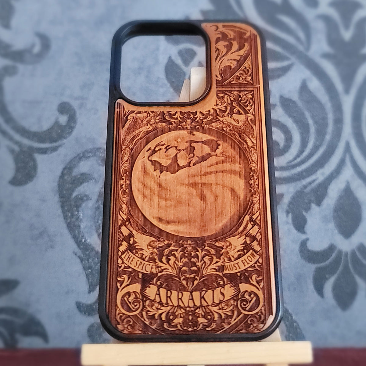 Sci fi desert wood phone case with detailed Arrakis style laser engraving