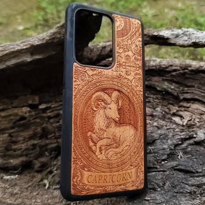 Unique wood phone case featuring Capricorn goat symbol engraving