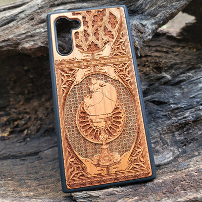 Gothic chalice artwork engraved on a wooden phone case, compatible with iPhone and Samsung Galaxy
