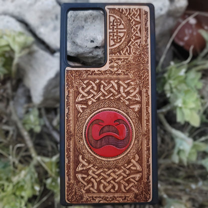 Painted wood phone case with Conan the Barbarian snake symbol and Celtic designs for iPhone and Galaxy