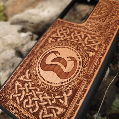 Wood phone case with Conan the Barbarian snake symbol and Celtic engravings for iPhone and Galaxy