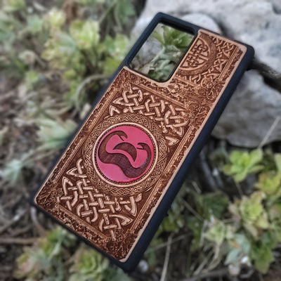 Painted wood phone case with Conan the Barbarian snake symbol and Celtic designs for iPhone and Galaxy