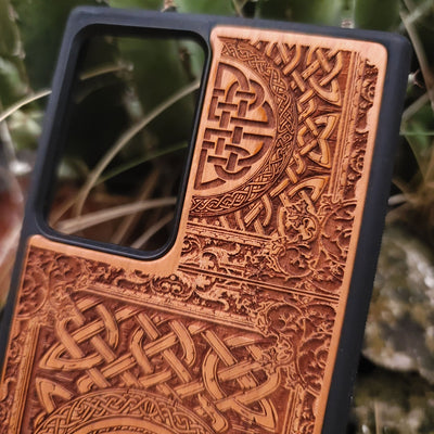 Wood phone case with Conan the Barbarian snake symbol and Celtic engravings for iPhone and Galaxy