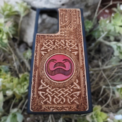 Painted wood phone case with Conan the Barbarian snake symbol and Celtic designs for iPhone and Galaxy