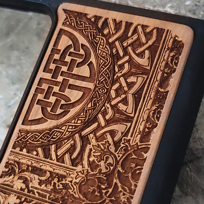 Painted wood phone case with Conan the Barbarian snake symbol and Celtic designs for iPhone and Galaxy