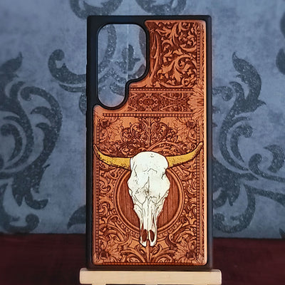 Cow skull wood phone case with hand painted horns and laser engraved western flourish pattern for iPhone and Samsung Galaxy