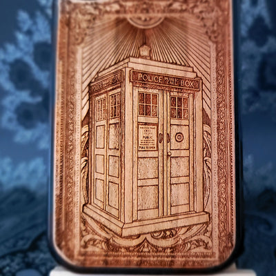 Deep laser engraved wooden phone case featuring a doctor who police box inspired sci-fi design on natural wood for iPhone and Samsung Galaxy models.