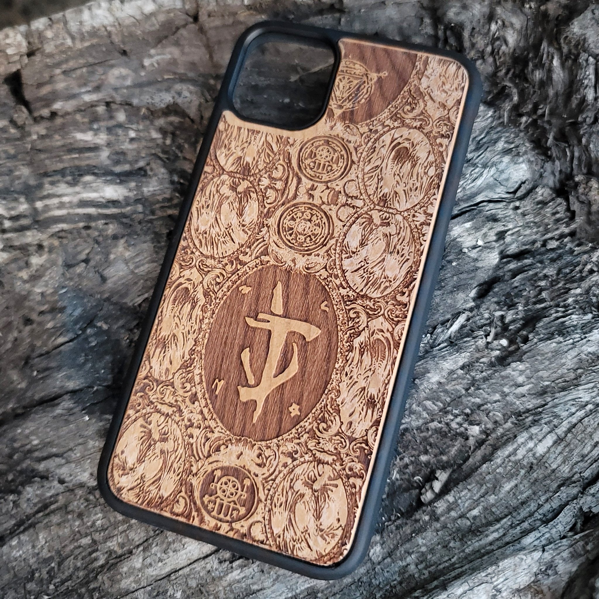 Wooden phone case with intricate Gothic pattern laser-engraved design for iPhone and Samsung Galaxy. Available for iPhone , 15, 14, 13, 12, 11 Pro Max Mini, and Samsung Galaxy S, S24, S23, S22, S21, S20 Ultra, Plus, Note 20. Stylish, durable, and unique.