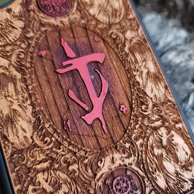 Doom-inspired gothic artwork engraved on a wooden phone case, compatible with iPhone  and Samsung Galaxy S.