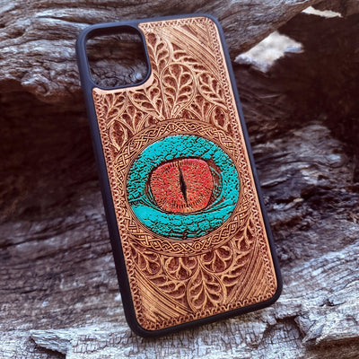 Dragon eye gothic artwork engraved on a wooden phone case, compatible with iPhone  and Samsung Galaxy S.