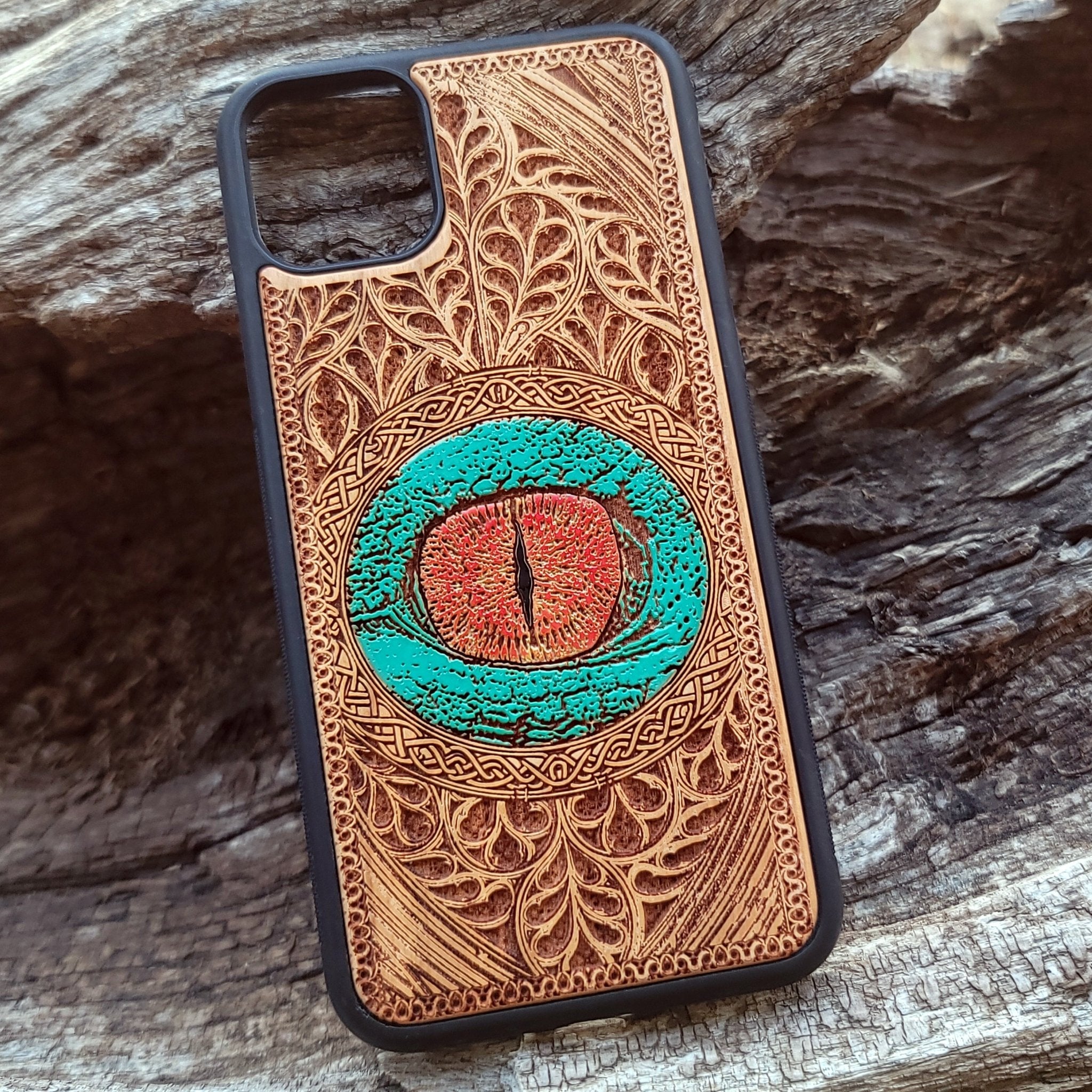 Dragon eye gothic artwork engraved on a wooden phone case, compatible with iPhone  and Samsung Galaxy S.