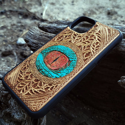 Dragon eye gothic artwork engraved on a wooden phone case, compatible with iPhone  and Samsung Galaxy S.
