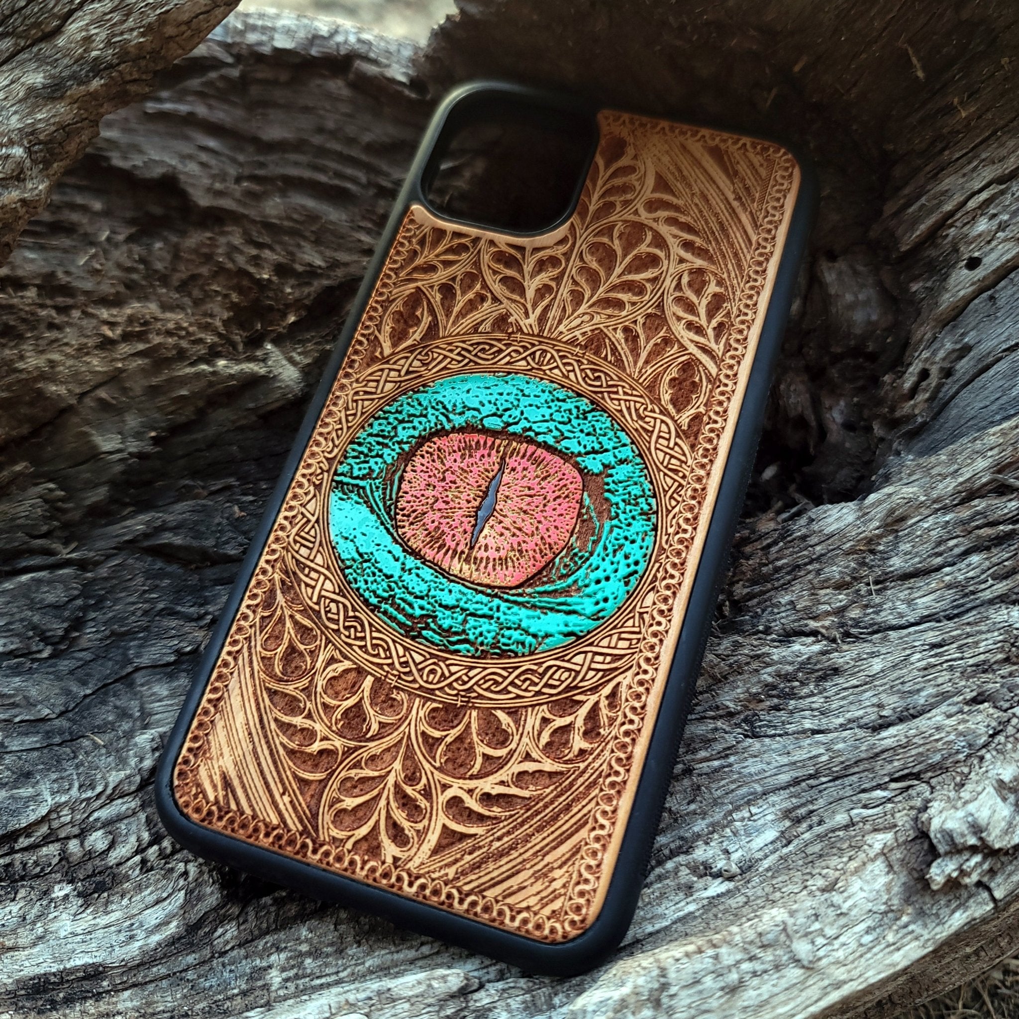 Dragon eye gothic artwork engraved on a wooden phone case, compatible with iPhone  and Samsung Galaxy S.