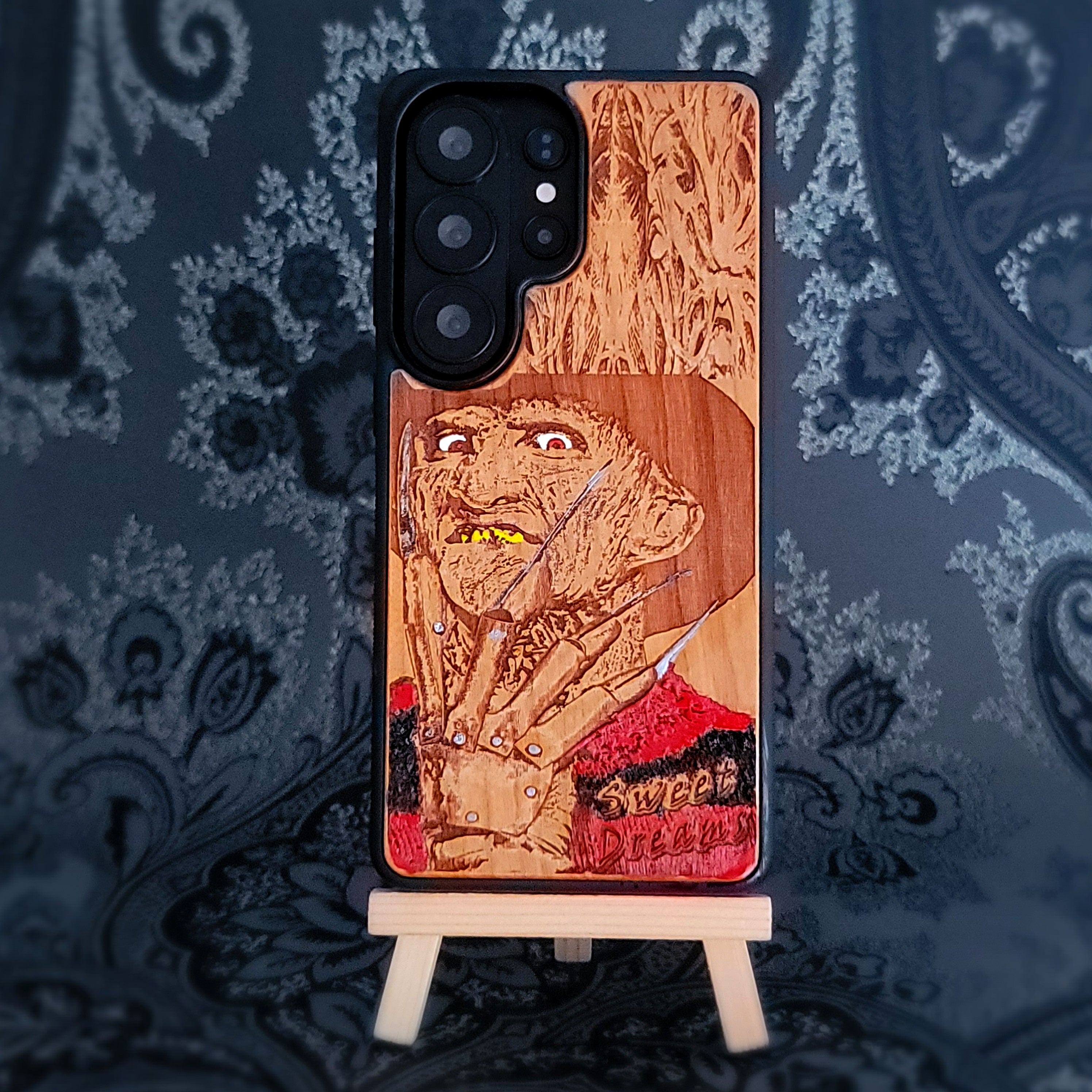 Hand-painted Freddy horror wood phone case for iPhone 16 and Galaxy S25, featuring nightmare slasher art design.