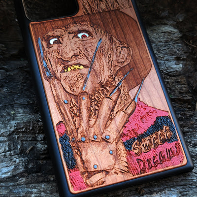 Freddy Krueger-inspired horror artwork engraved on a wooden phone case, compatible with iPhone  and Samsung Galaxy S.
