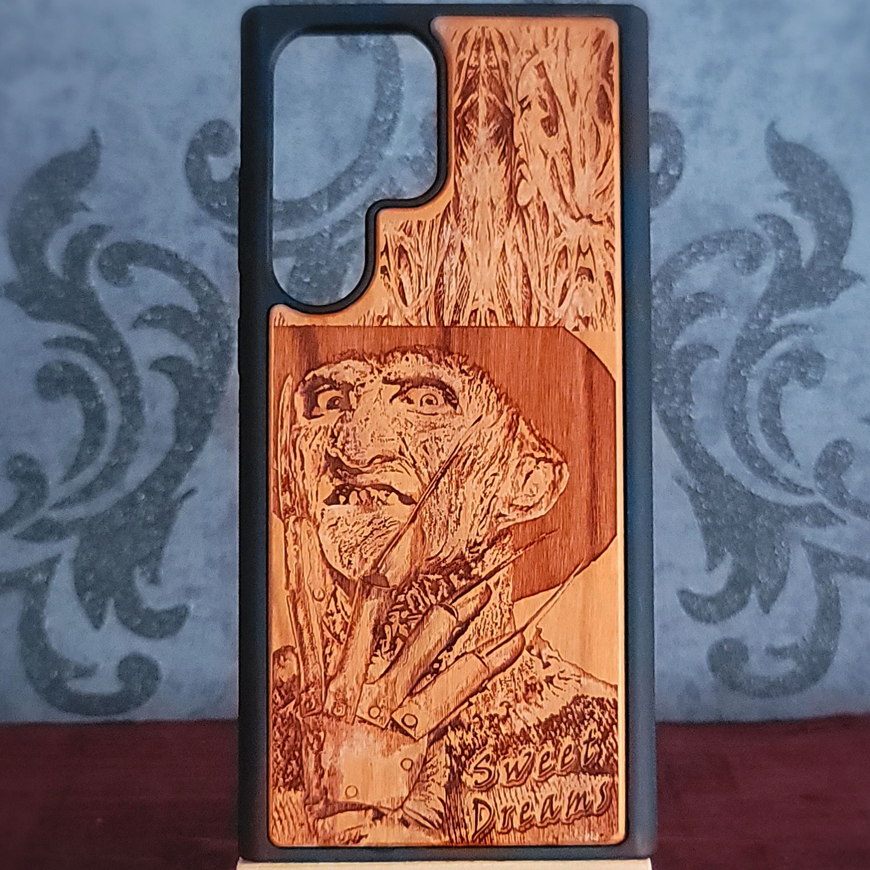 Laser-engraved wooden phone case with Freddy Krueger horror design, perfect for iPhone and Samsung Galaxy