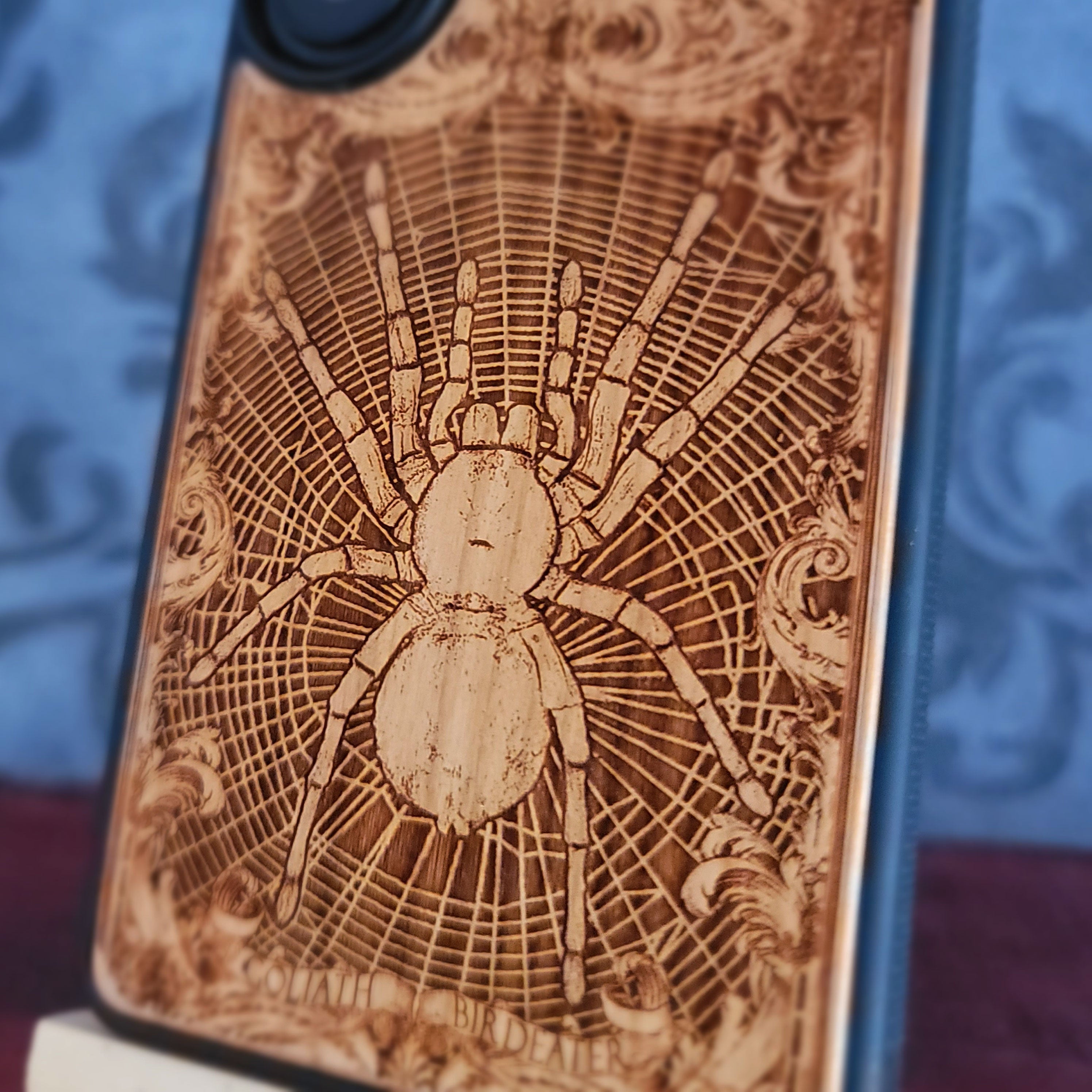 Laser-engraved Goliath Birdeater spider wood phone case for iPhone and samsung Galaxy – arachnid-inspired wooden gift.