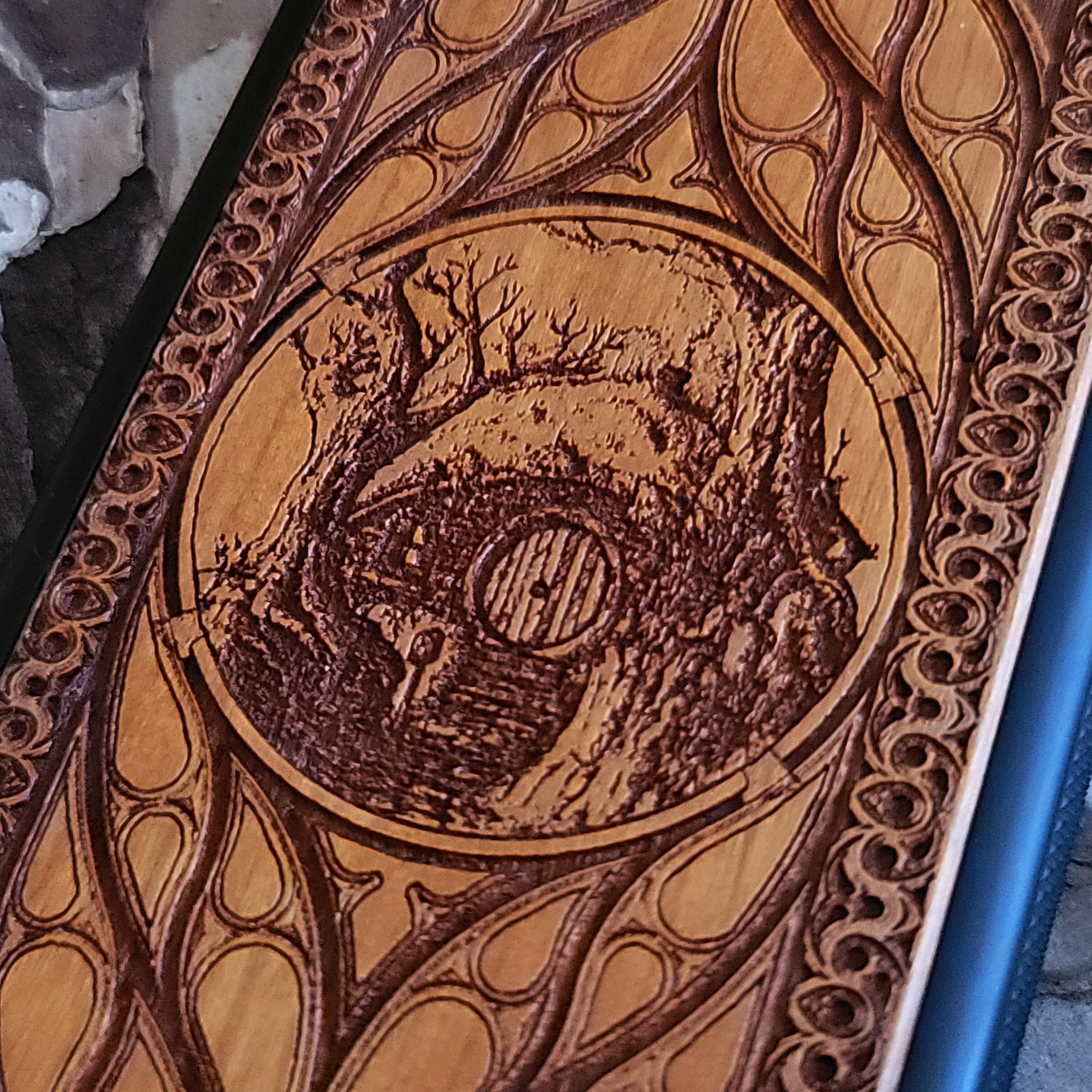 Wooden phone case for iPhone & Samsung Galaxy with Hobbit Door symbol, laser-engraved and hand-painted. Compatible with iPhone 16,15, 14, 13, 12, 11 Pro Max Mini and Samsung Galaxy S25,S24, S23, S22, S21, S20 Ultra Plus Note 20. Slim, durable, and fantasy-inspired design.