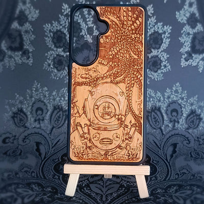 Wooden phone case featuring a detailed deep-sea diver and kraken design, laser-engraved for iPhone , iPhone 15, Samsung Galaxy S, and other models. A must-have for fans of nautical and mythical art.