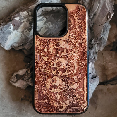 Handcrafted wooden phone case with detailed skull engravings inspired by medieval church architecture, compatible with iPhone , iPhone 15, iPhone 14, iPhone 13, iPhone 12, iPhone 11 Pro Max, iPhone 11 Mini, Samsung Galaxy S, S24, S23, S22, S21, S20 Ultra Plus, and Note 20.