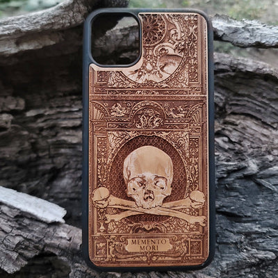Wooden Memento Mori II phone case with intricate gothic skull design, compatible with iPhone , iPhone 15, Galaxy S, Galaxy S24, and other models. Ideal for horror and gothic art lovers.