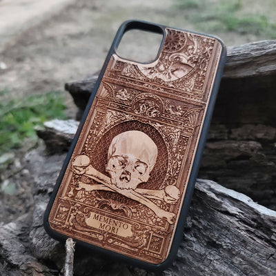 Wooden Memento Mori II phone case with intricate gothic skull design, compatible with iPhone , iPhone 15, Galaxy S, Galaxy S24, and other models. Ideal for horror and gothic art lovers.