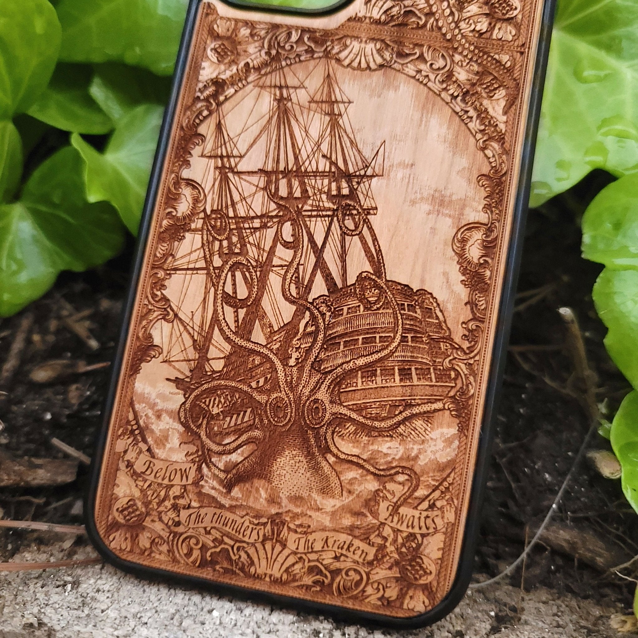 Wood phone case engraved with Kraken sea monster eating a ship, fits iPhone –11 and Samsung Galaxy S–S20