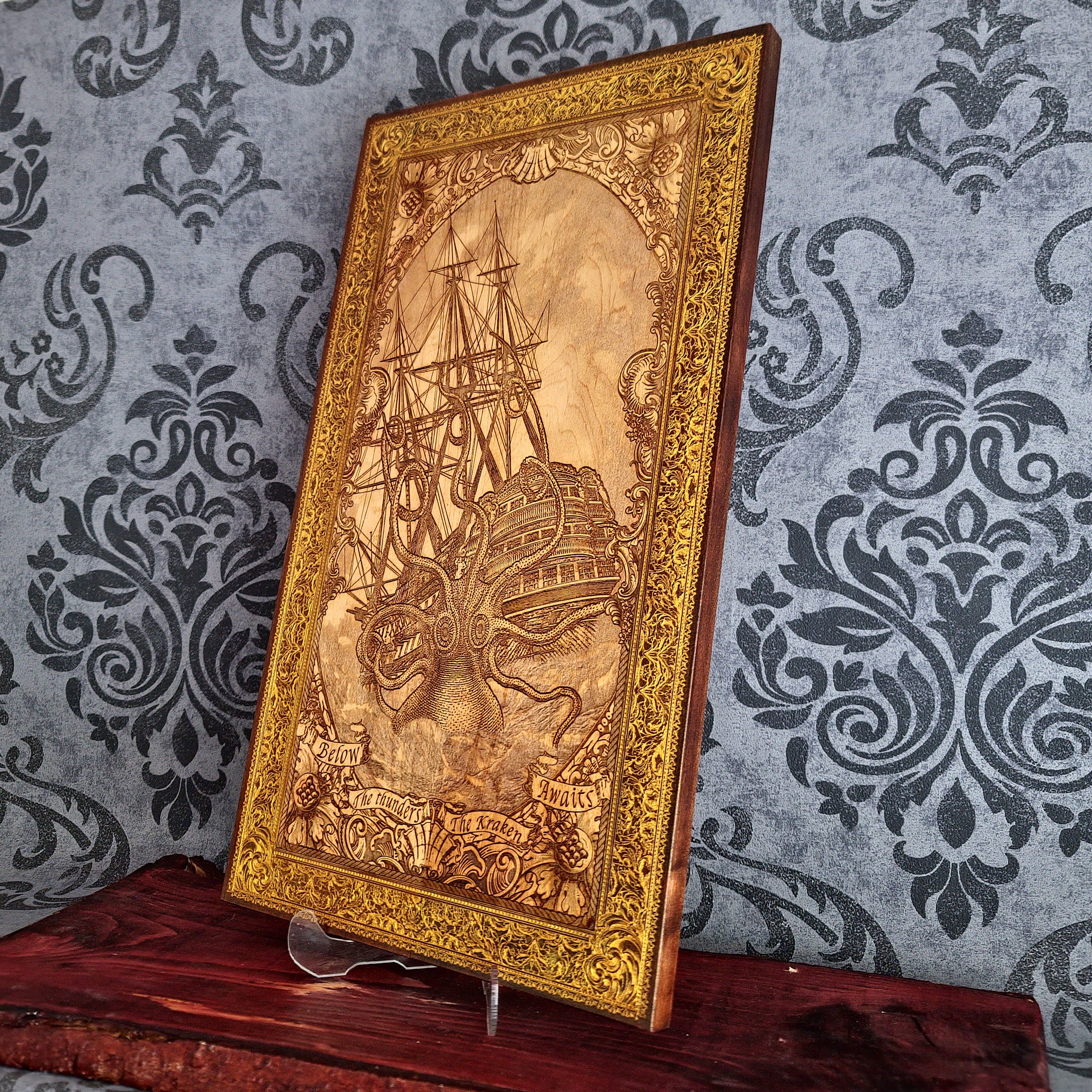 Engraved woodcut wall art of Kraken sea monster attacking sailing boat, nautical maritime décor